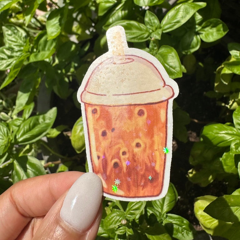 A die-cut sticker of an iced coffee or chai tea or iced tea drink with a beige foam top. Stickers for water bottle, laptop sticker, cute sticker, cool sticker