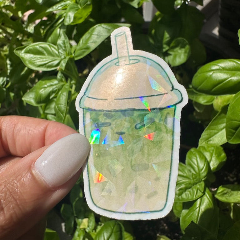 A die-cut sticker of an matcha ice tea drink with cream on top. Stickers for water bottle, laptop sticker, cute sticker, cool sticker
