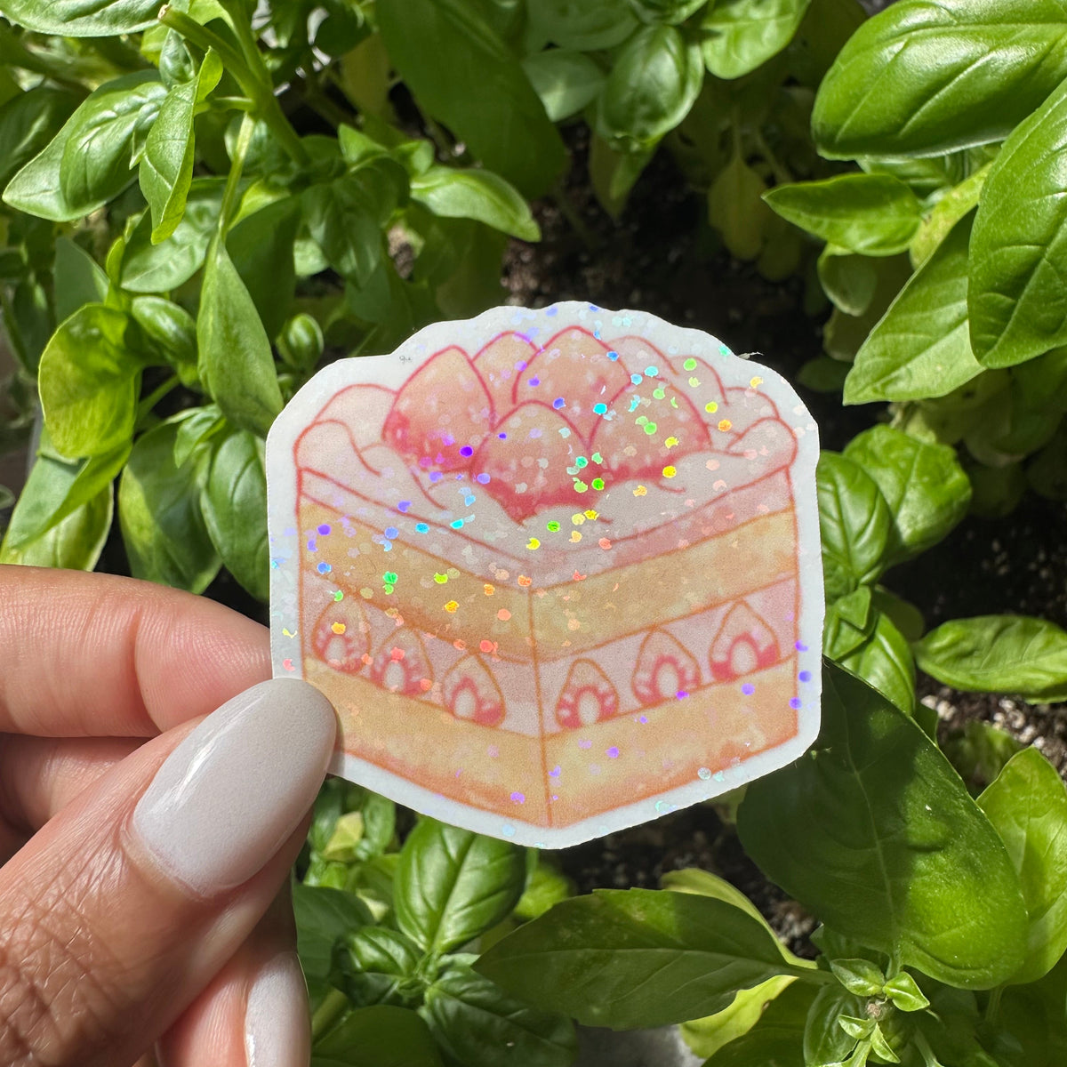 A die-cut sticker featuring a cute strawberry shortcake cake sticker , set against a background of a cozy garden. Stickers for water bottle, laptop sticker, cute sticker, cool sticker 